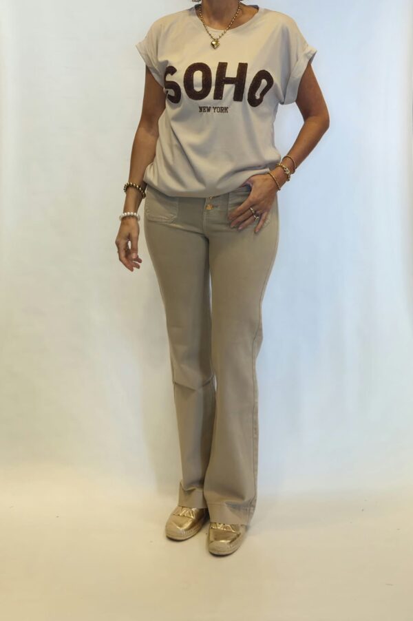 broek button zand